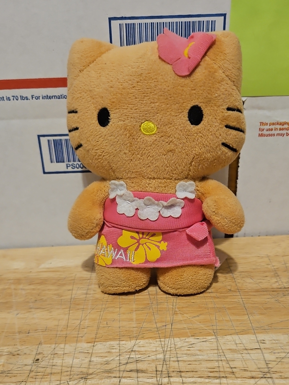 Hello Kitty Pink Hawaiian Dress Plush with Yellow Flower Accent